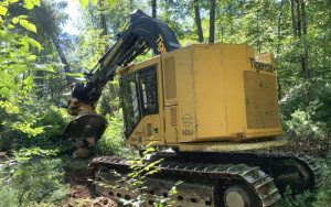 An Adirondack Tigercat 822E track feller buncher during logging operations